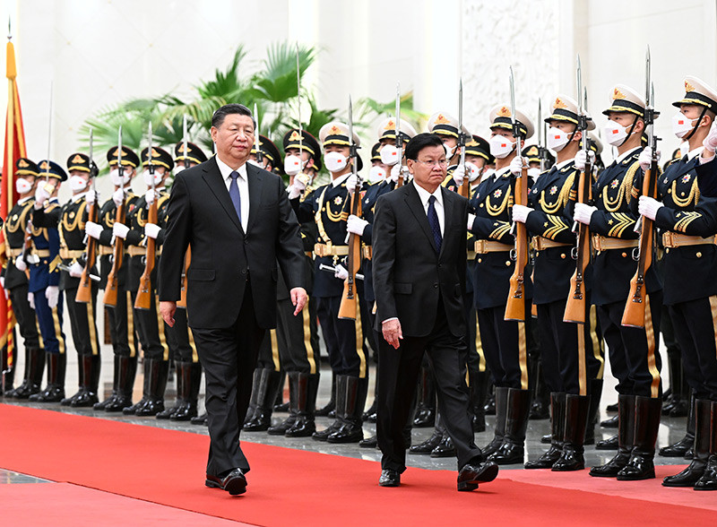 习近平举行仪式欢迎老挝人民革命党中央总书记 国家主席访华