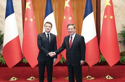 李强会见法国总统