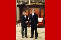 丁薛祥会见老挝副总理兼外长
