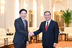 李强会见新加坡副总理兼财政部长