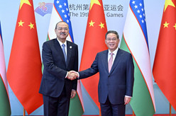 李强会见乌兹别克斯坦总理