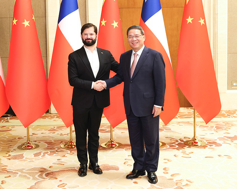 李强会见智利总统