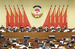 全国政协十四届常委会第八次会议举行全体会议 王沪宁出席