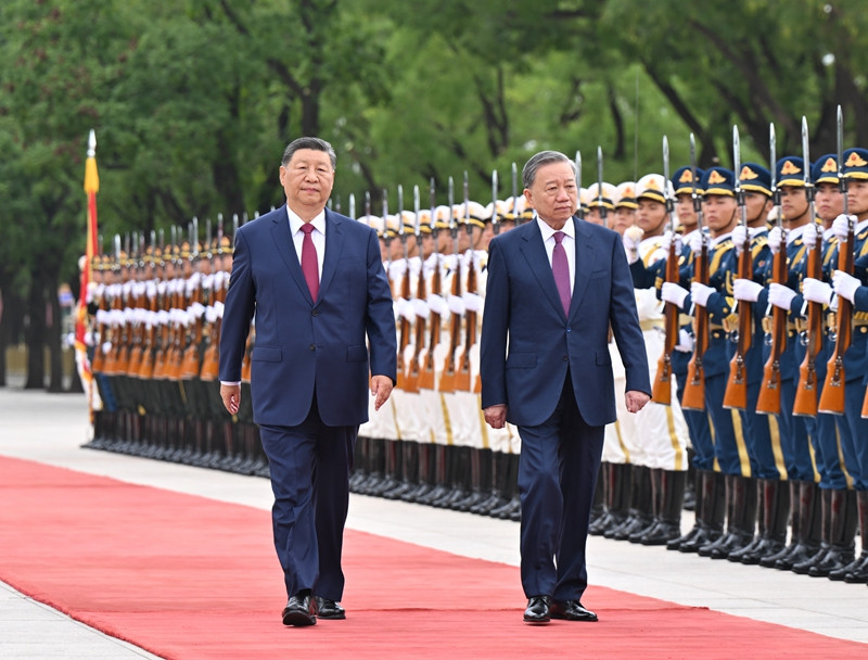 习近平举行仪式欢迎越共中央总书记、国家主席访华
