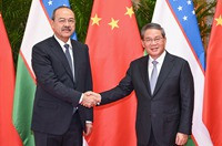 李强会见乌兹别克斯坦总理