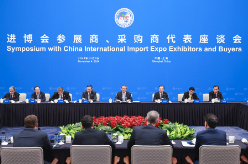 李强同第七届中国国际进口博览会参展商、采购商代表座谈