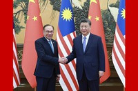 习近平会见马来西亚总理