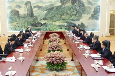 李强会见日本执政党代表团