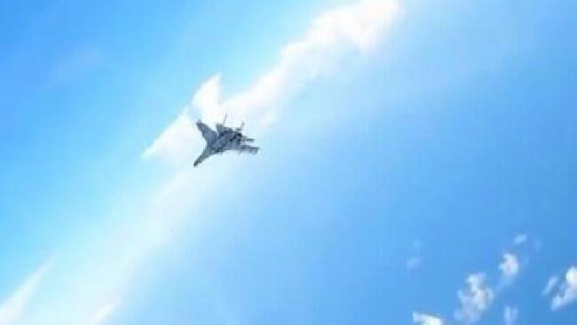 菲律宾1架C-208型机非法闯入中国黄岩岛领空 南部战区依法依规跟踪监视 警告驱离