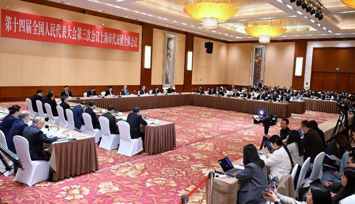 上海代表团举行开放审议 回答中外记者提问