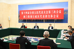 丁薛祥分别参加香港代表团、澳门代表团审议