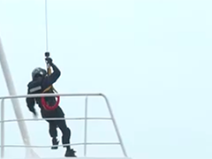 我国南部海区海空立体救助演练举行