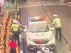 武汉：考生险些误考 交警快骑上演“生死时速”