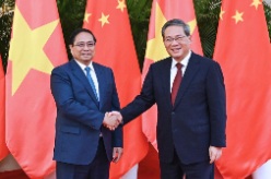 李强会见越南总理