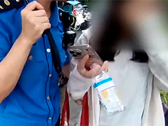 女子浑身瘫软 执法队员撑起“保护伞”