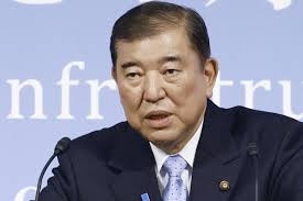 日本首相称不会在日美贸易谈判中轻易妥协