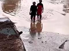西班牙多地洪水泛滥 英国再遭热浪侵袭
