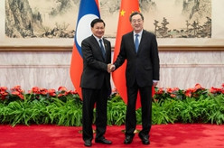 丁薛祥会见老挝人民革命党中央总书记、国家主席