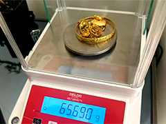 金市火爆藏猫腻 警方揭“鬼秤”克扣黄金黑幕