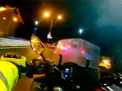 深圳:台风天孕妇突发不适 交警开道护送