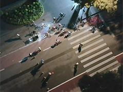 上海滨江"暴骑团"网上晒视频 警方无人机喊话设卡严打