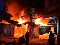 广西河池一市场凌晨突发火灾 过火面积约600平方米