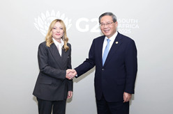 李强会见意大利总理