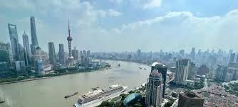 经合组织最新经济展望报告 对2025年中国经济增速预测继续上调到5%