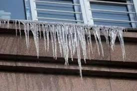 警惕"冰溜子"伤人 远离屋檐等结冰区