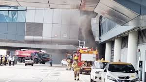 香港机场中场客运廊发生二级火警 无人受伤 部分航班运营受影响