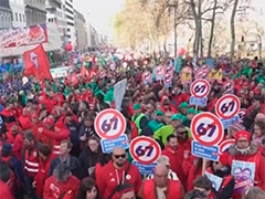比利时 抗议政府养老金和失业制度改革 近十万民众在布鲁塞尔举行示威活动