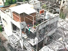伊朗集束弹袭击以色列中部 多地建筑受损