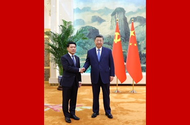 习近平会见老挝人民革命党中央总书记、国家主席特使沙伦赛