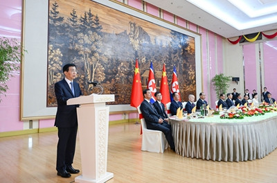 王沪宁出席《中朝友好合作互助条约》签订65周年纪念招待会
