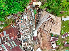 哥伦比亚地震一月后 佩雷拉民众废墟中艰难重建